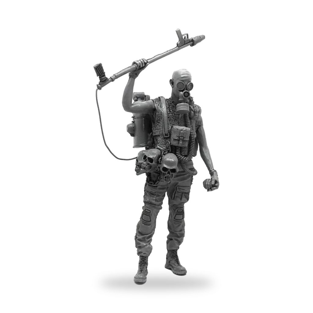 Unpainted resin figure of armed man with flamethrower and gas mask in post-apocalyptic setting.