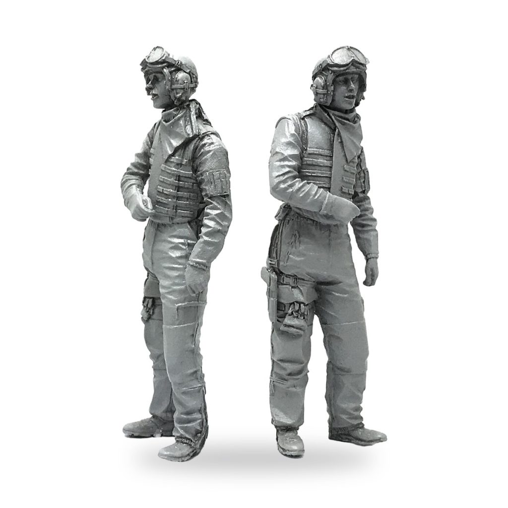 Unpainted US Army soldier figure in flight gear and helmet.
