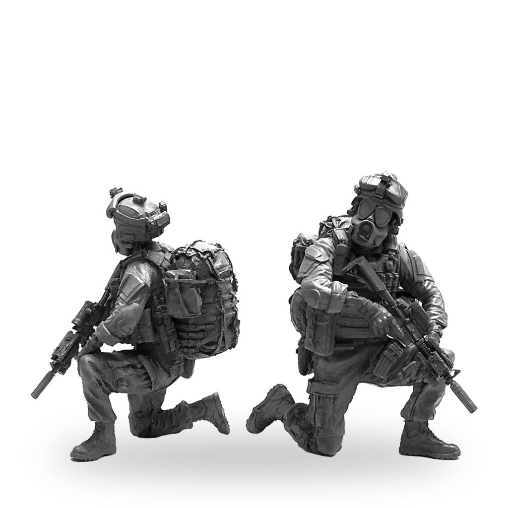 Unpainted 1/35 US Army Delta Force soldier figure in tactical gear with rifle and backpack.