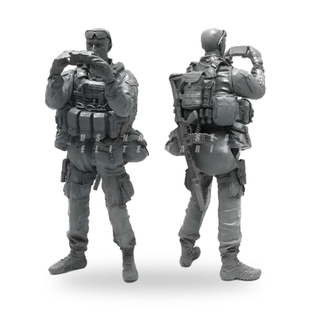 Unpainted 1/35 scale US Marine taking photo with binoculars in full gear.