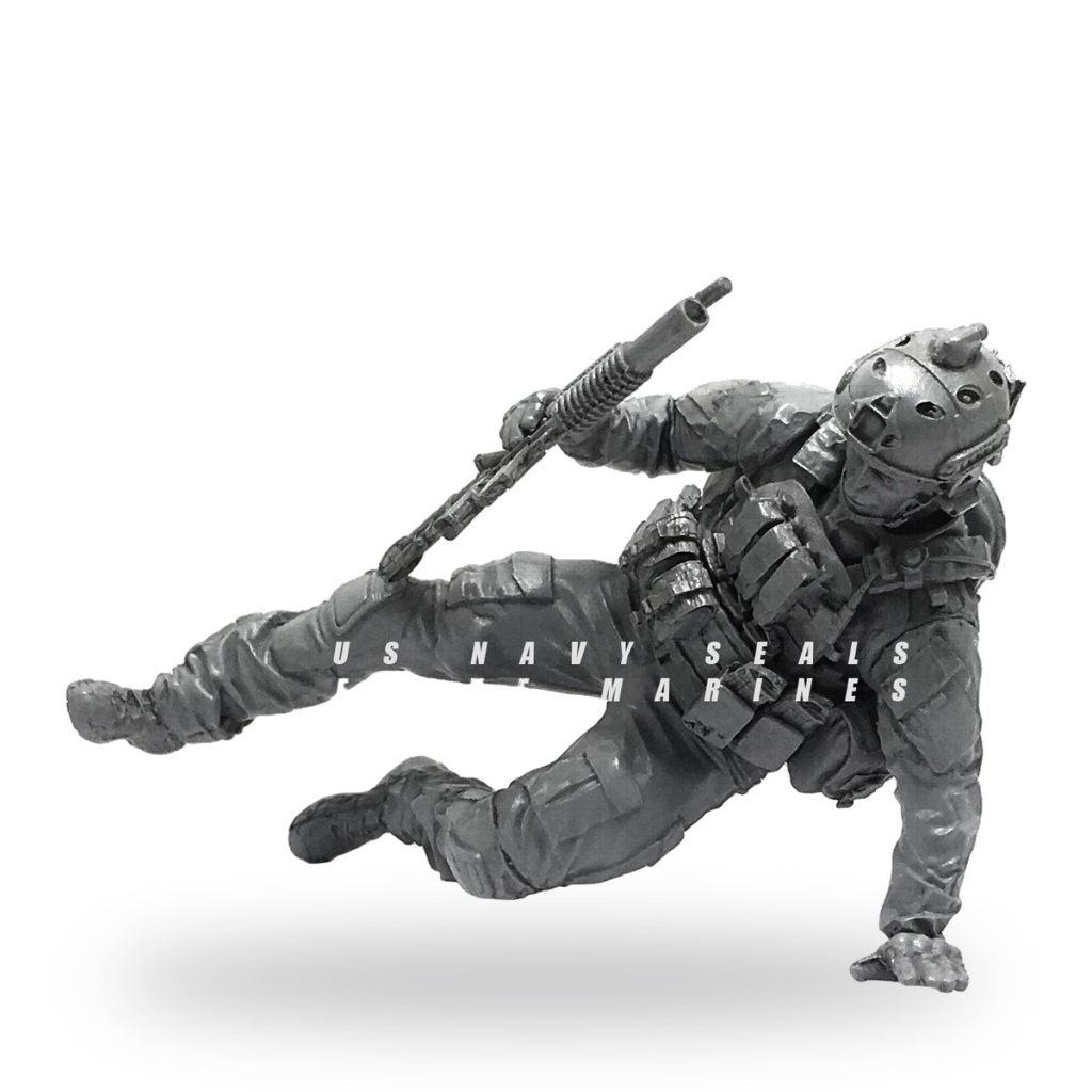 Unpainted US Navy SEAL soldier figure in dynamic combat pose with rifle.