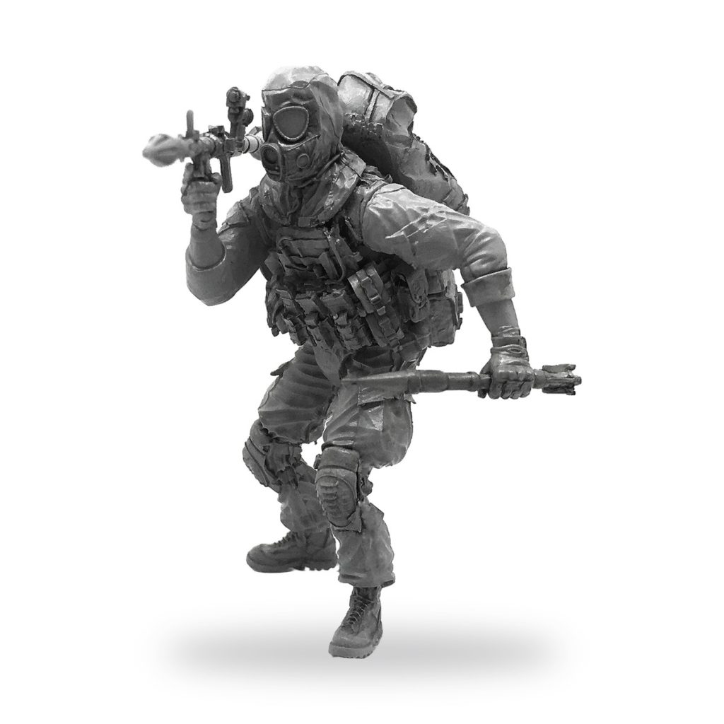 Unpainted 1/35 Special Forces soldier with RPG rocket launcher and gas mask.