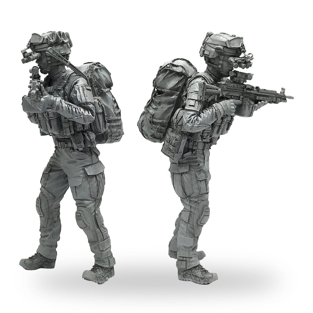 Unpainted US Navy SEAL soldier with assault rifle and gear in dynamic pose.