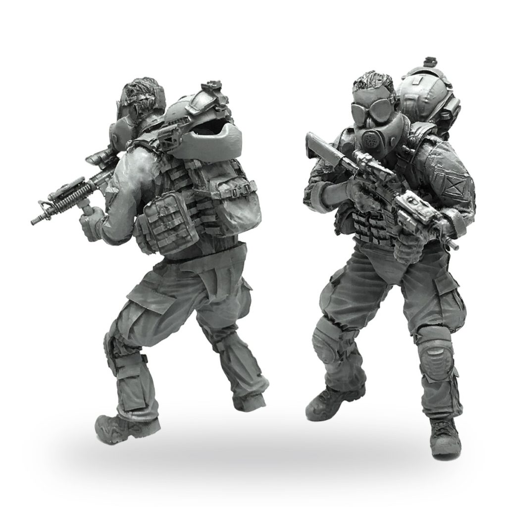 Unpainted US Army CBRN elite soldier figures in tactical gear with rifles.