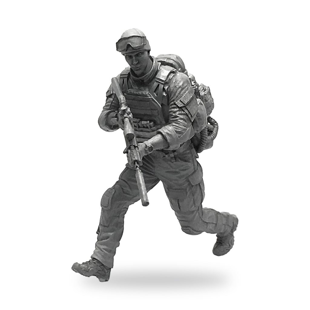Unpainted US Army Special Forces Commando rifleman in tactical gear and helmet.