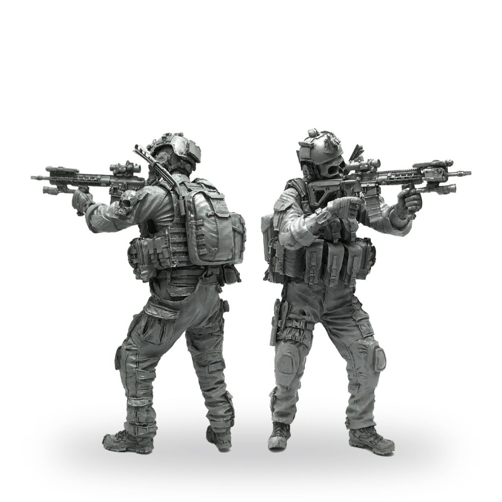 Unpainted 1/35 scale modern soldier with skull mask and assault rifle resin figure.