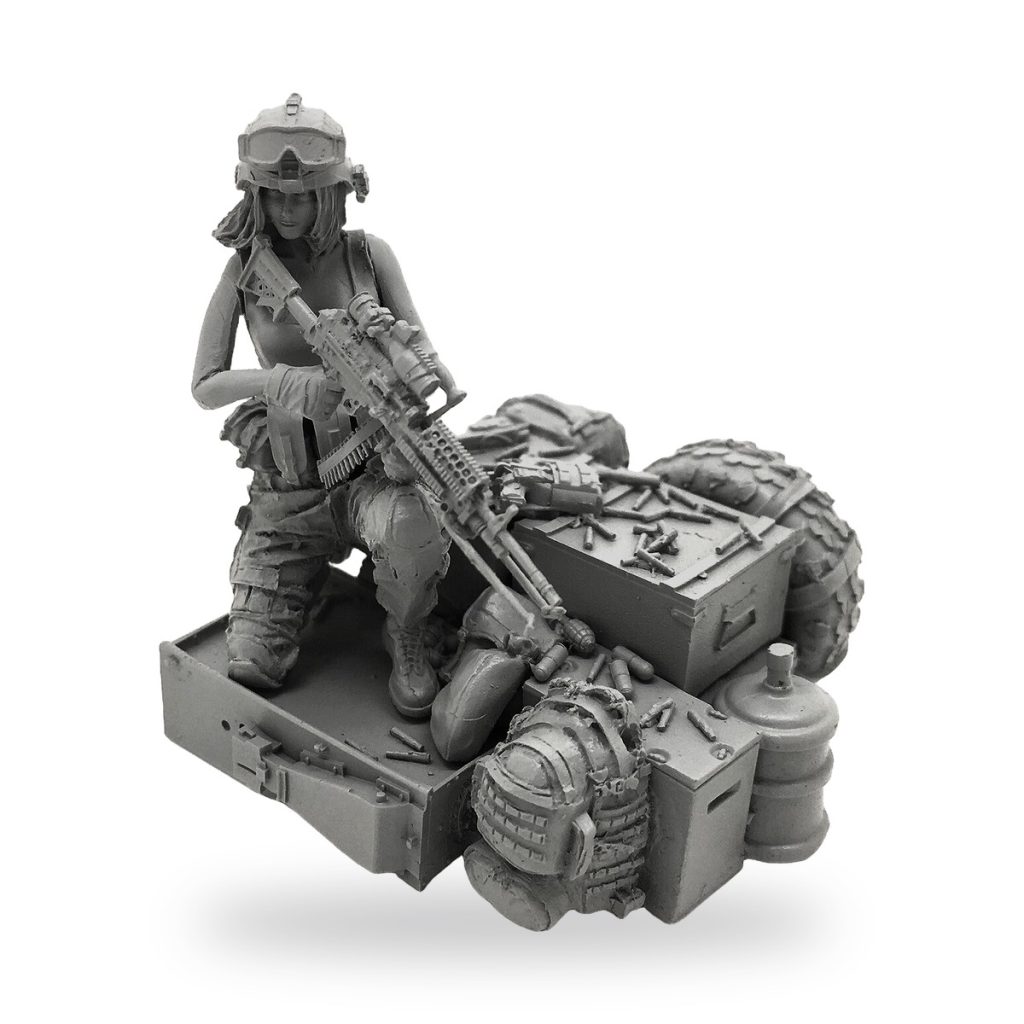 Unpainted female soldier with rifle and gear on base.