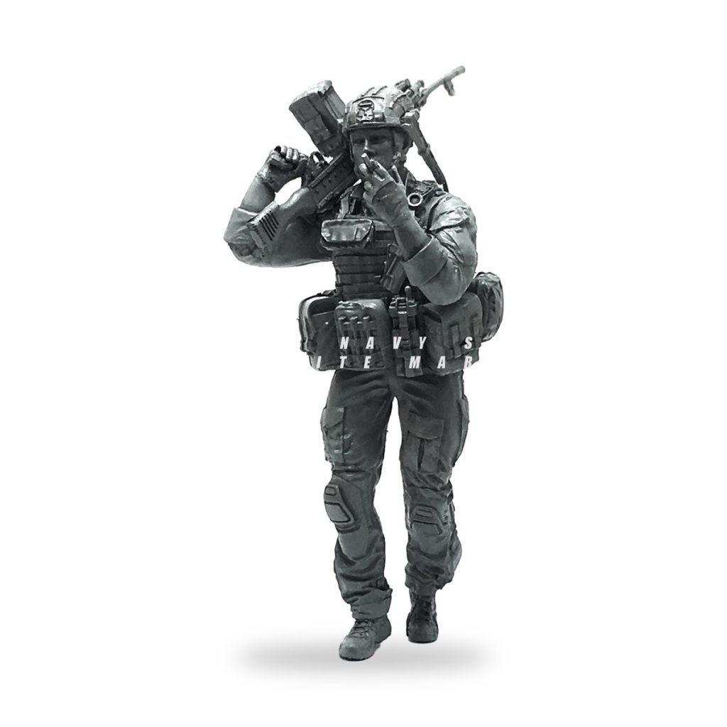 Unpainted US Navy SEAL soldier figure smoking with rifle and gear.