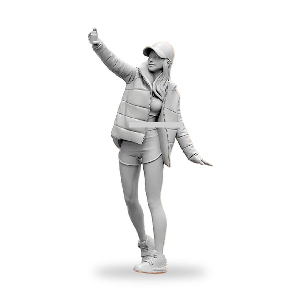 Unpainted resin figure of sporty girl in jacket and cap taking selfie.