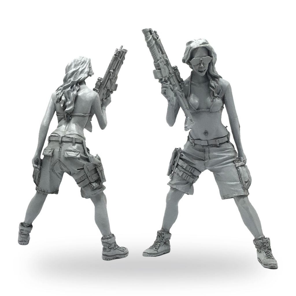 Unpainted female soldier in bikini top and shorts holding rifle.