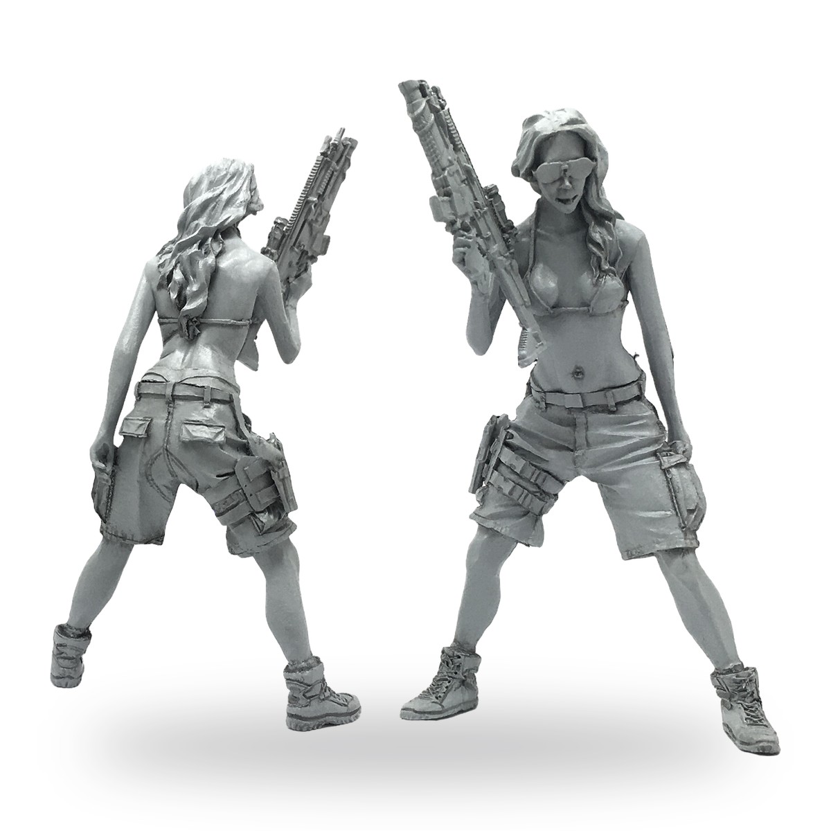 Unpainted female soldier in bikini top and shorts holding rifle.