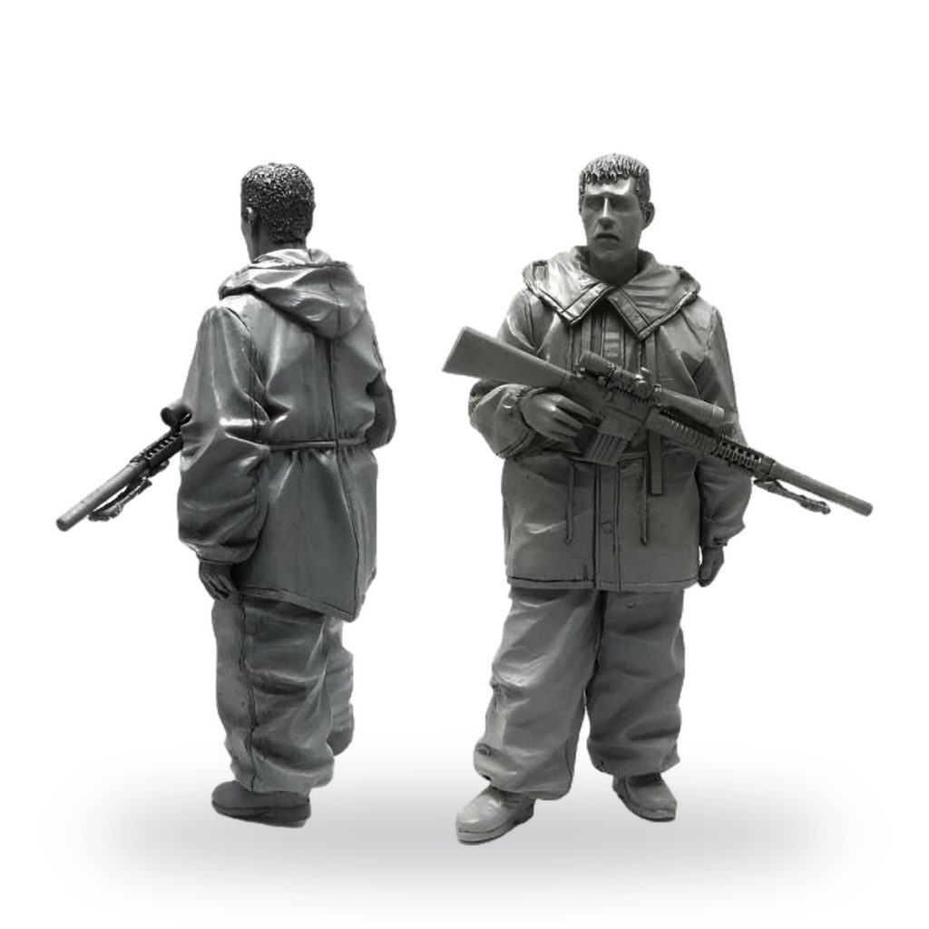 Unpainted 1/35 scale winter sniper soldier miniature figure with rifle.