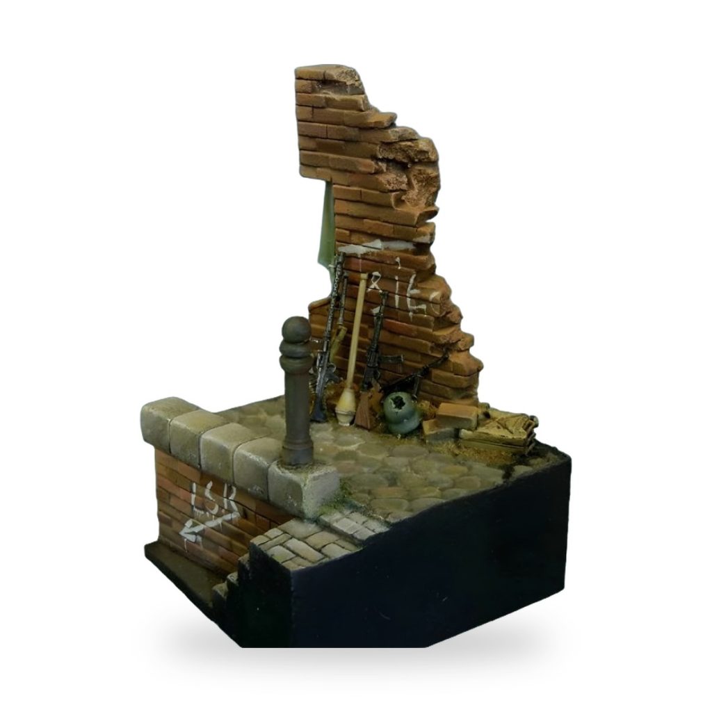 Unpainted brick wall ruin with weapons and debris in Civil War zone setting.