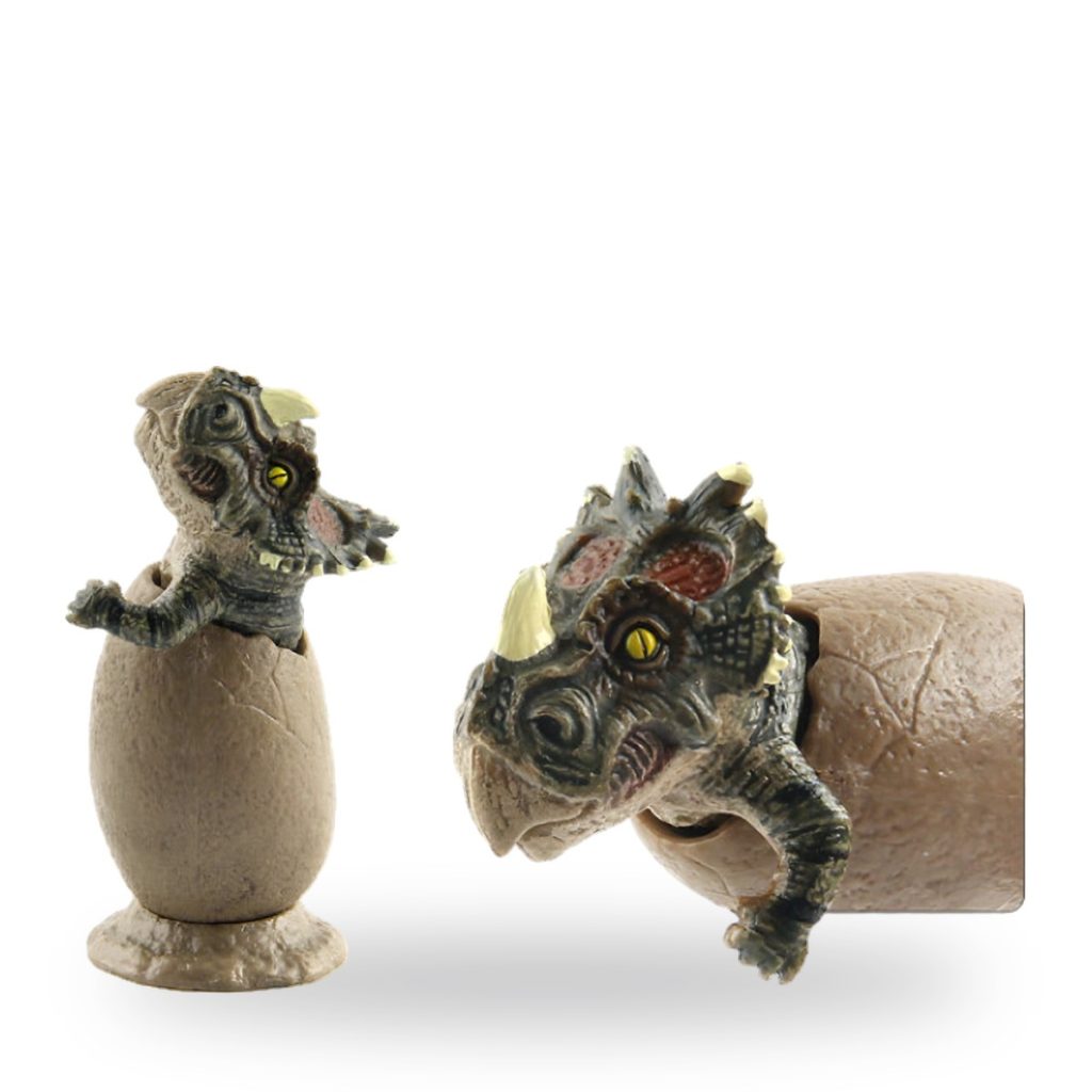Two baby dinosaur figures hatching from eggs in different poses.