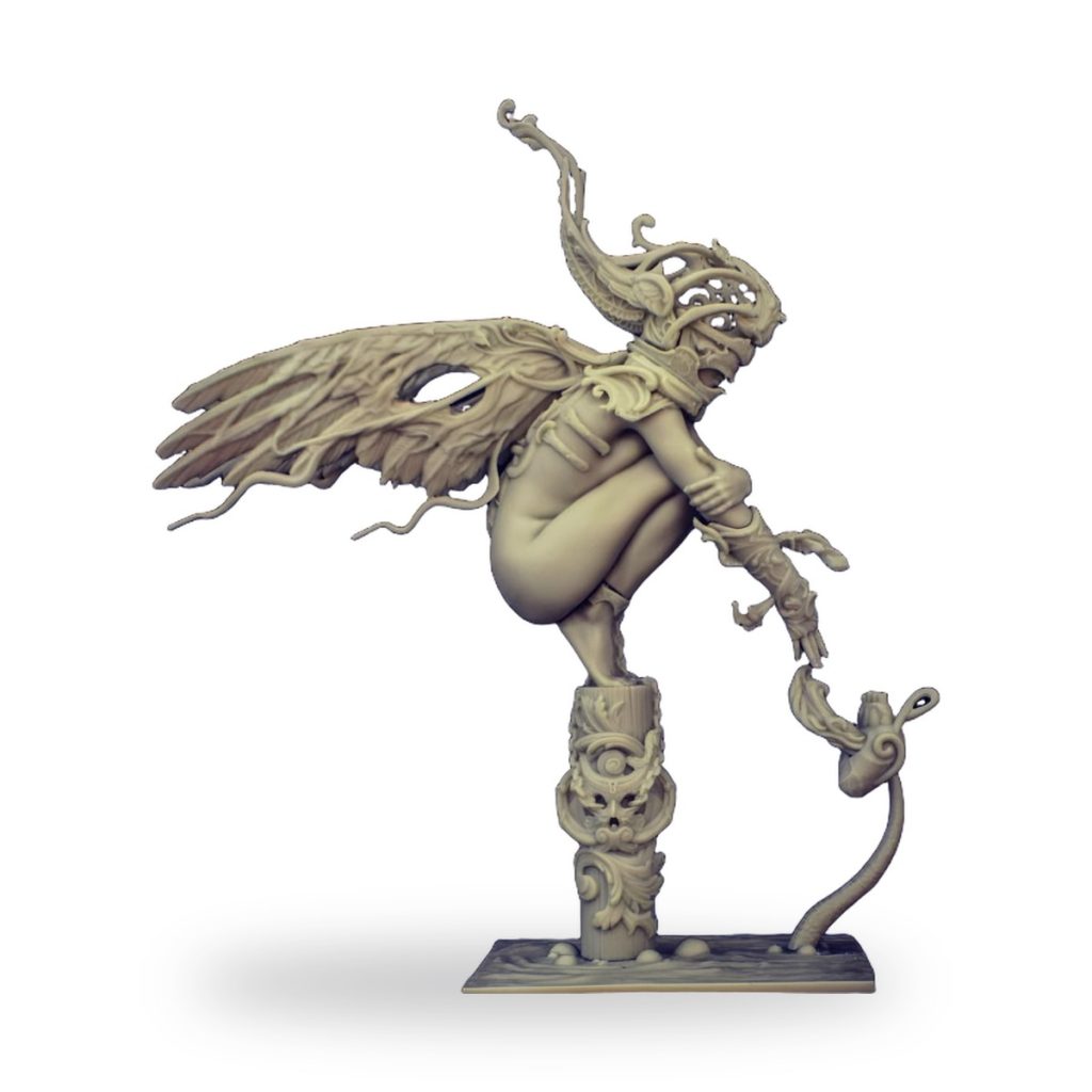 Unpainted fairy warrior figure with wings and ornate armor perched on decorative stand.