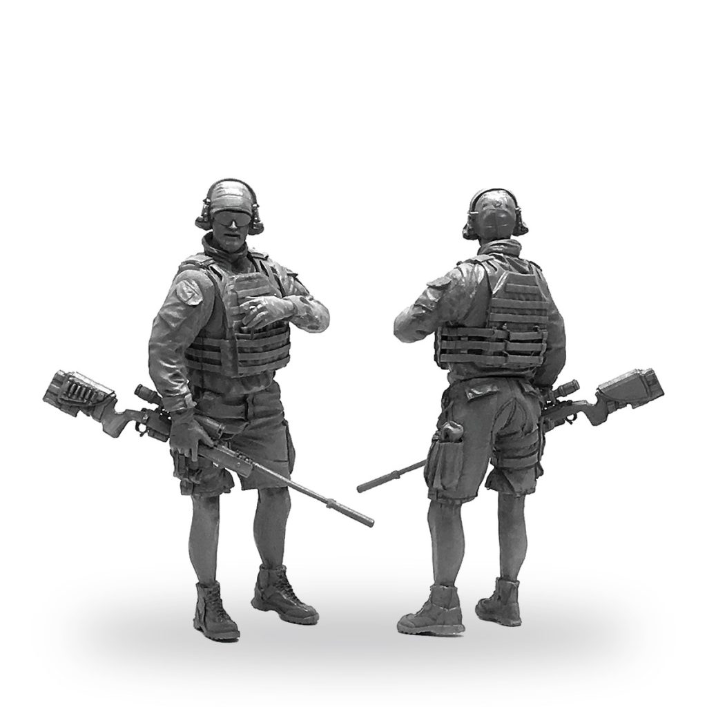 Unpainted 1/35 scale soldier miniature in tactical gear with rifle.