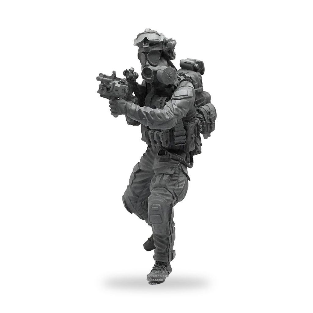 Unpainted resin figure of modern CBRN infantry soldier in tactical gear holding rifle.