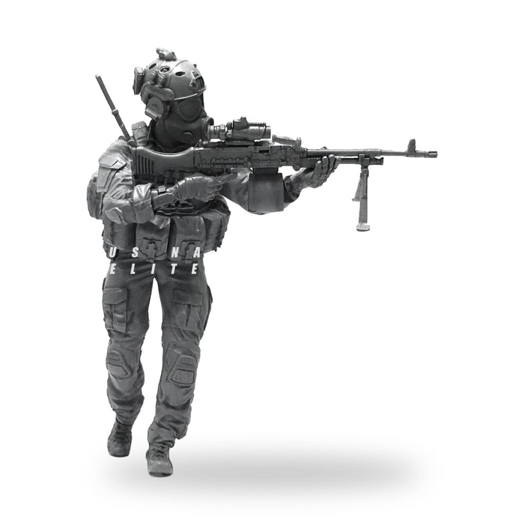 Unpainted 1/35 resin soldier in CBRN gear with machine gun.