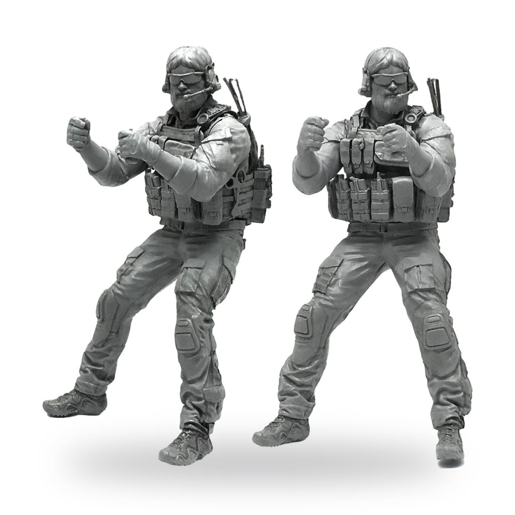 Unpainted modern soldier miniature in tactical gear with backpack and pouches.
