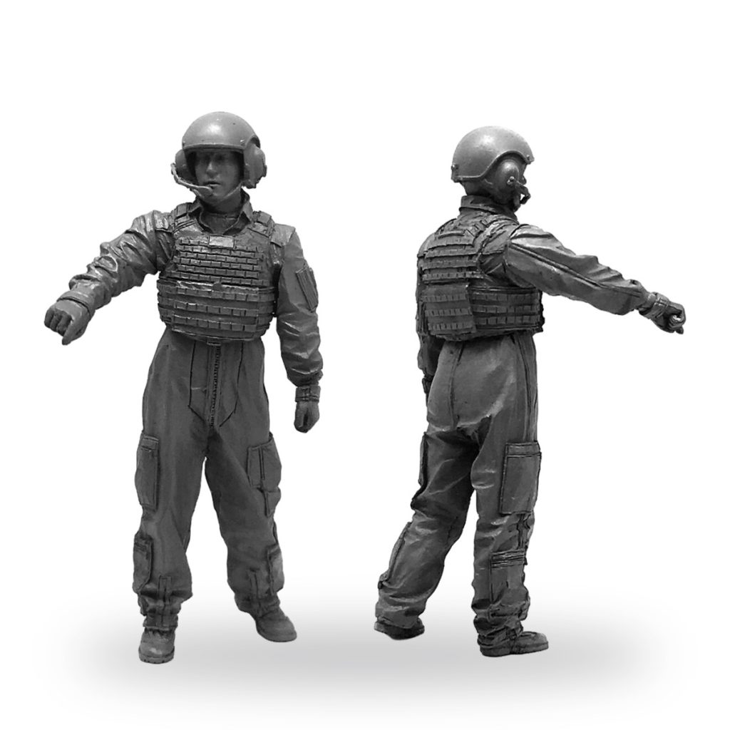 Unpainted 1/35 scale resin miniature of infantry soldier in tactical gear and helmet.
