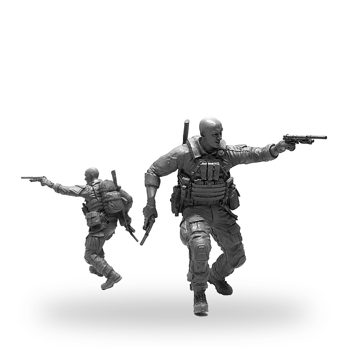 Unpainted resin figures of two special forces soldiers in combat poses with pistols.