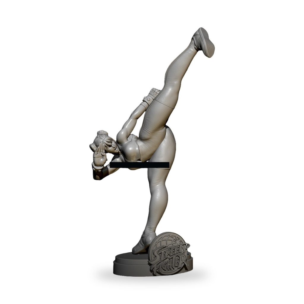 Unpainted Street Fighter Chun-Li statue in high kick pose on base.