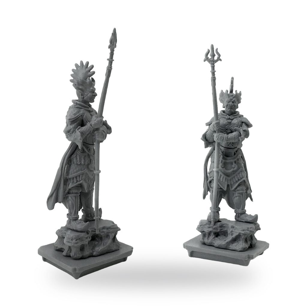 Unpainted GK Ancient Dynasty Japanese Kingdom Guard figures with spears on rocky bases.