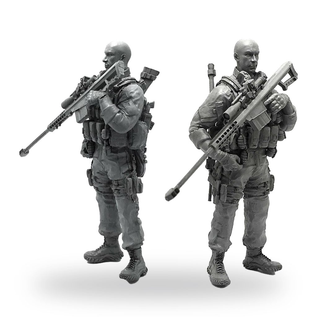 Unpainted 1/35 scale modern soldier sniper miniature in tactical gear holding rifle.