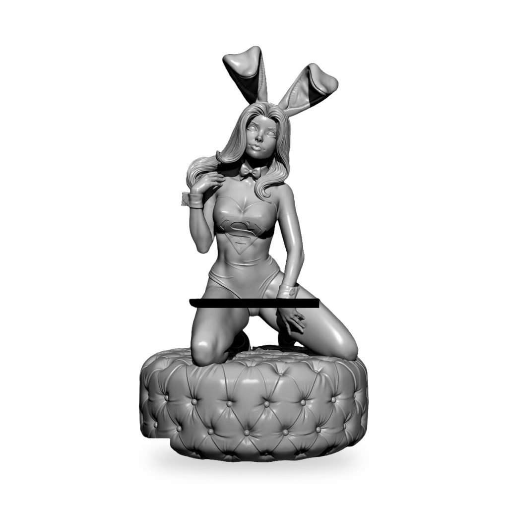 Unpainted resin figure of Supergirl in bunny costume kneeling on tufted base.