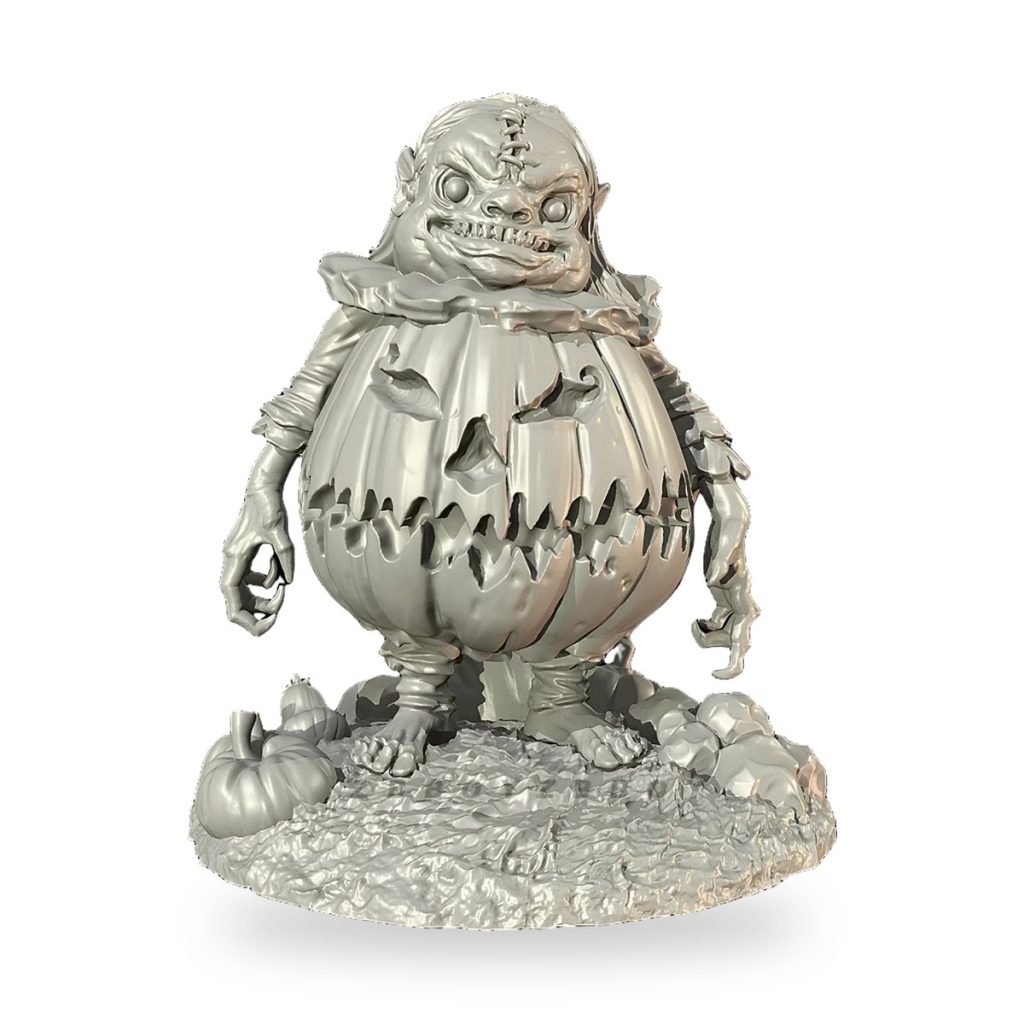 Unpainted Halloween monster with pumpkin body and stitched face on rocky base.