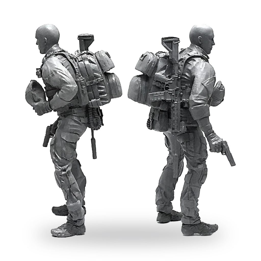 Unpainted US SEAL special forces soldier figure with gear and weapons.