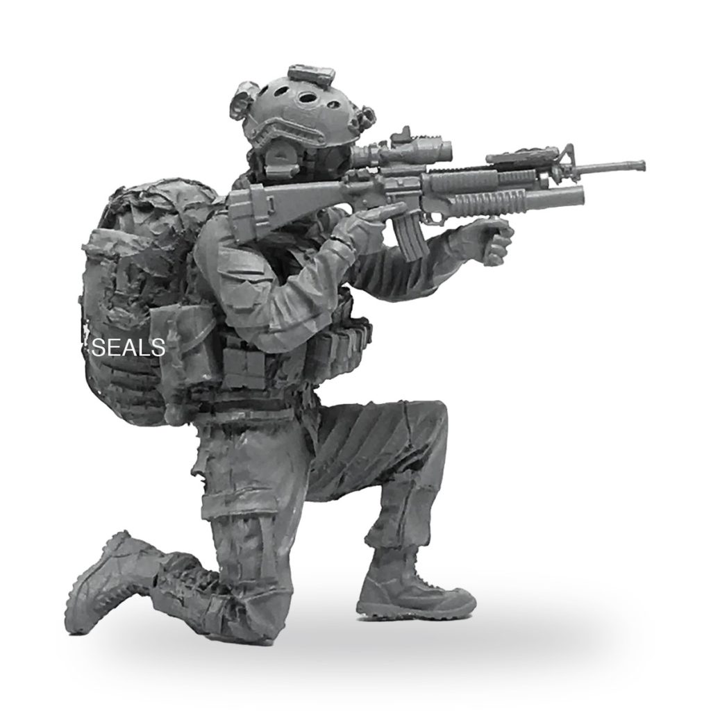 Unpainted US Navy SEAL soldier kneeling with rifle and backpack.