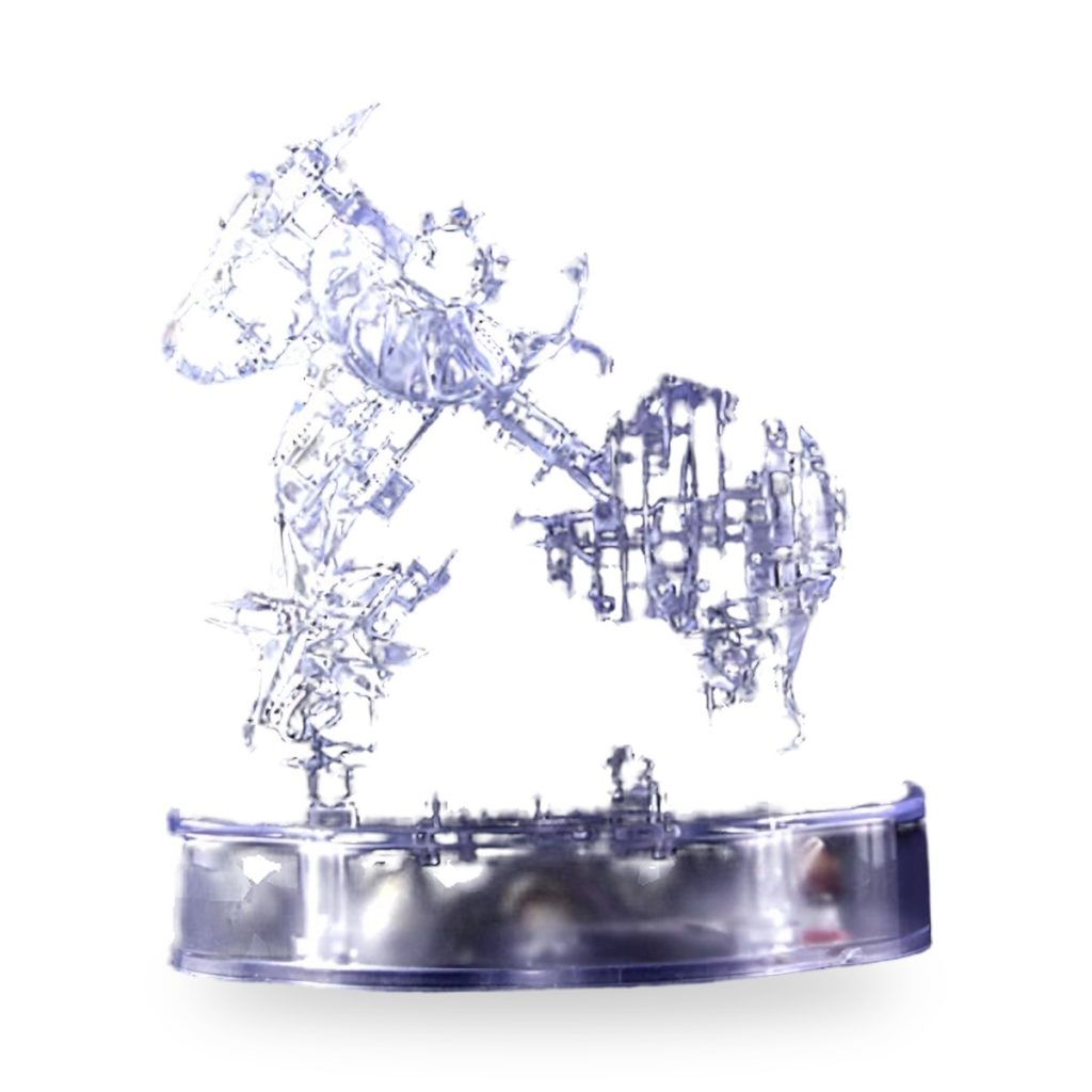 Transparent crystal zodiac sign puzzle figure on circular base.
