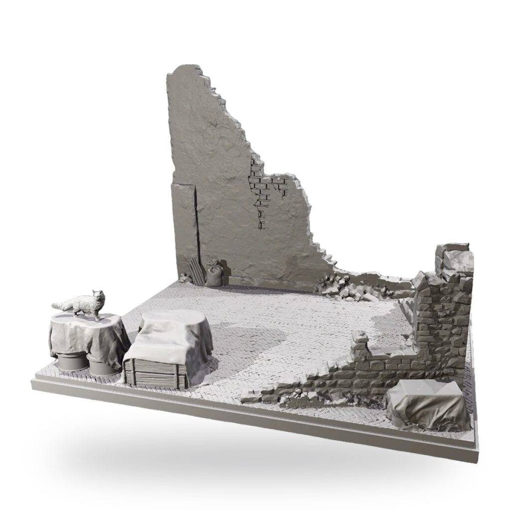 Unpainted resin diorama base with brick wall ruins and covered objects.