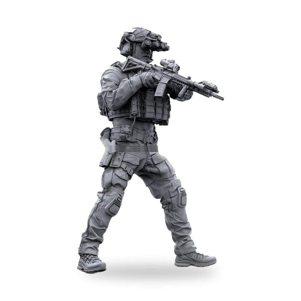 Unpainted 1/35 resin figure of special forces soldier in tactical gear holding rifle.