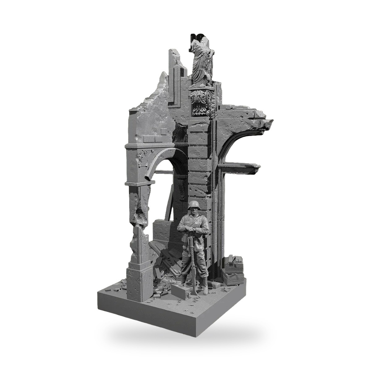 Unpainted WWII soldier stands in ruined building diorama with debris and statue.