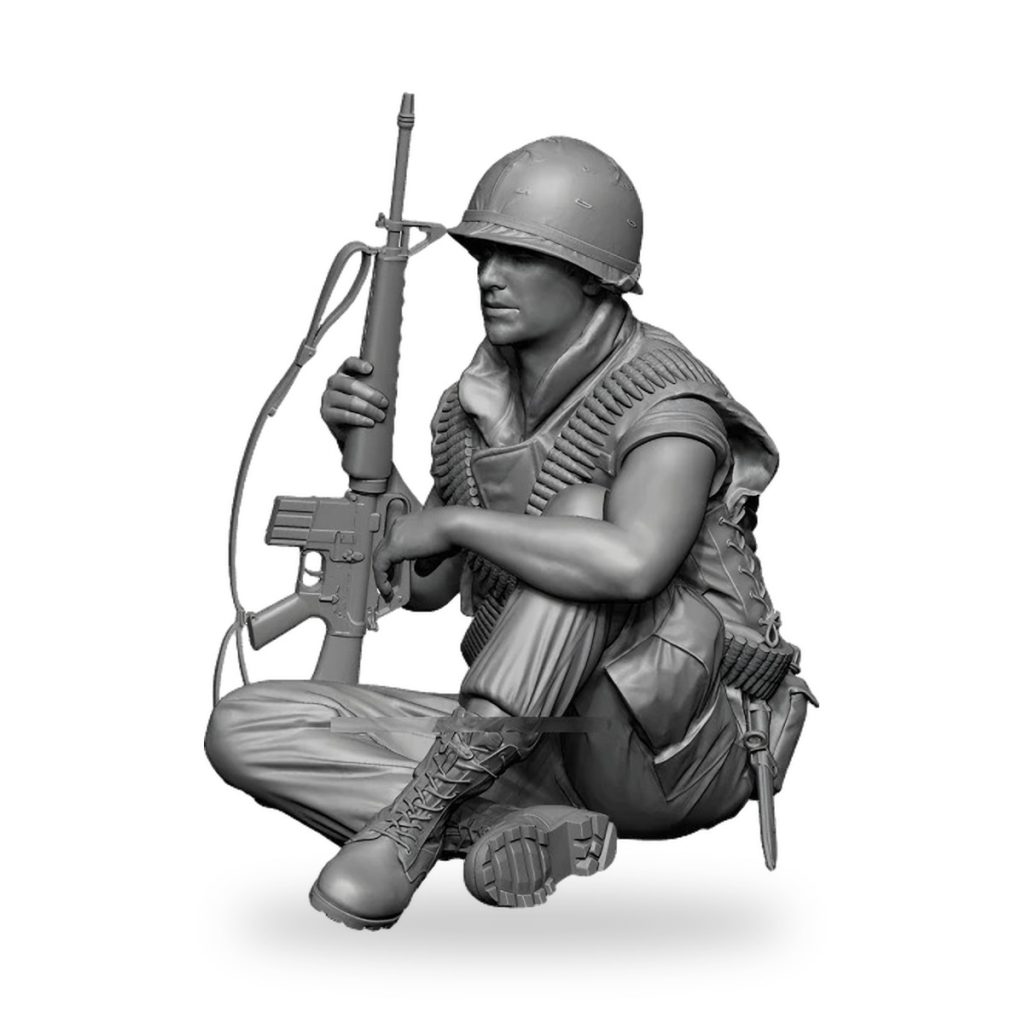Unpainted WWII soldier in crouched pose holding rifle with ammo belt and helmet.