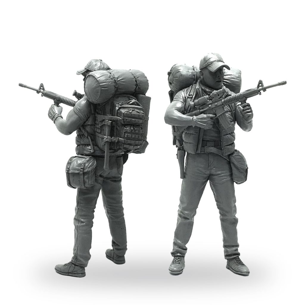 Unpainted 1/35 American armed militia guard figure with rifle and backpack.