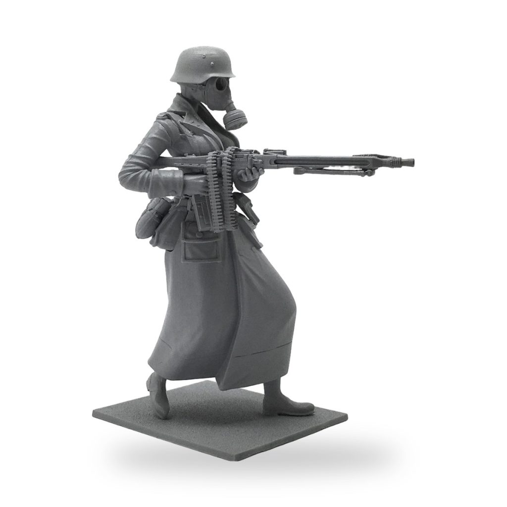 Unpainted WW2 German female soldier figure with gas mask and rifle.