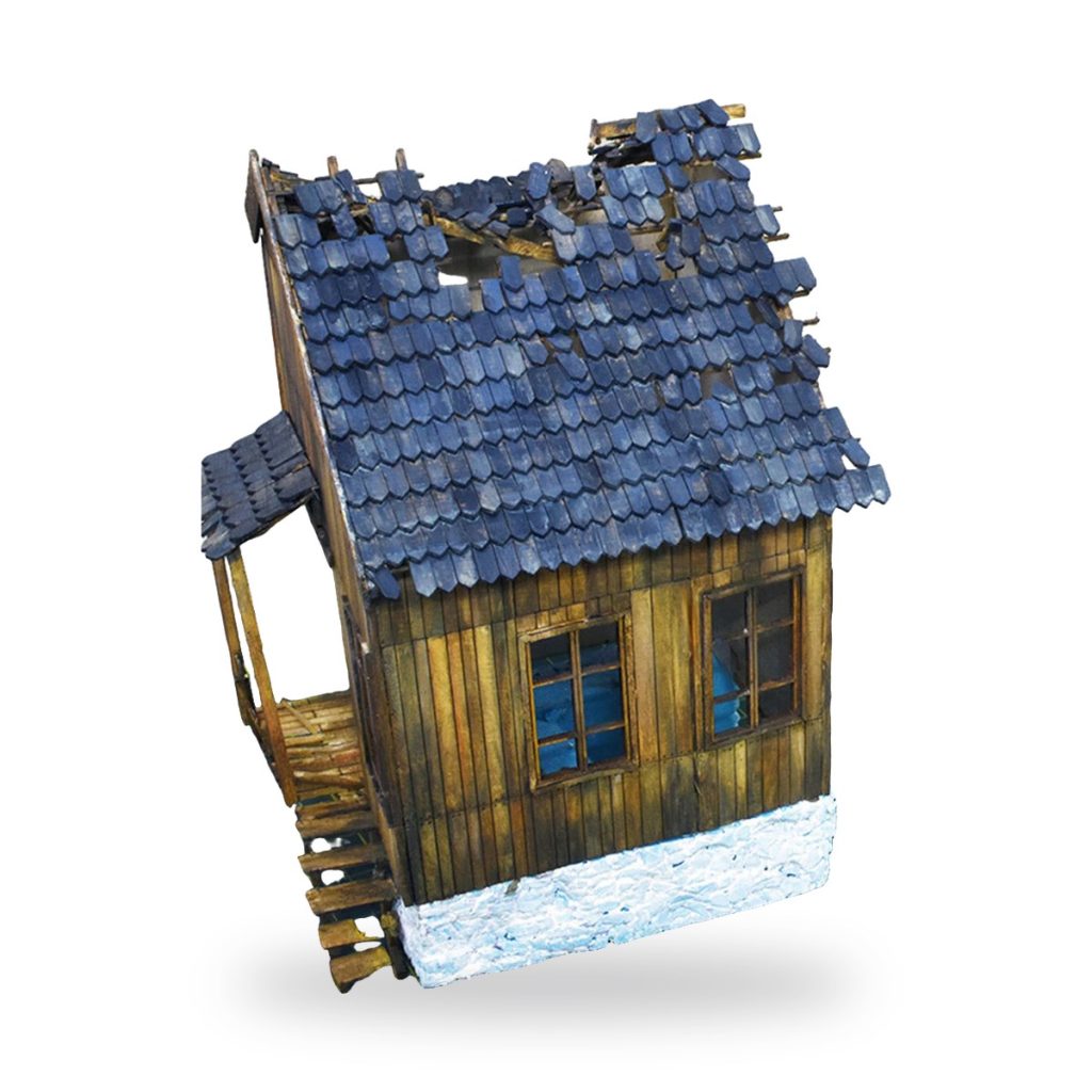 Unpainted wooden chalet with blue roof and snow base.