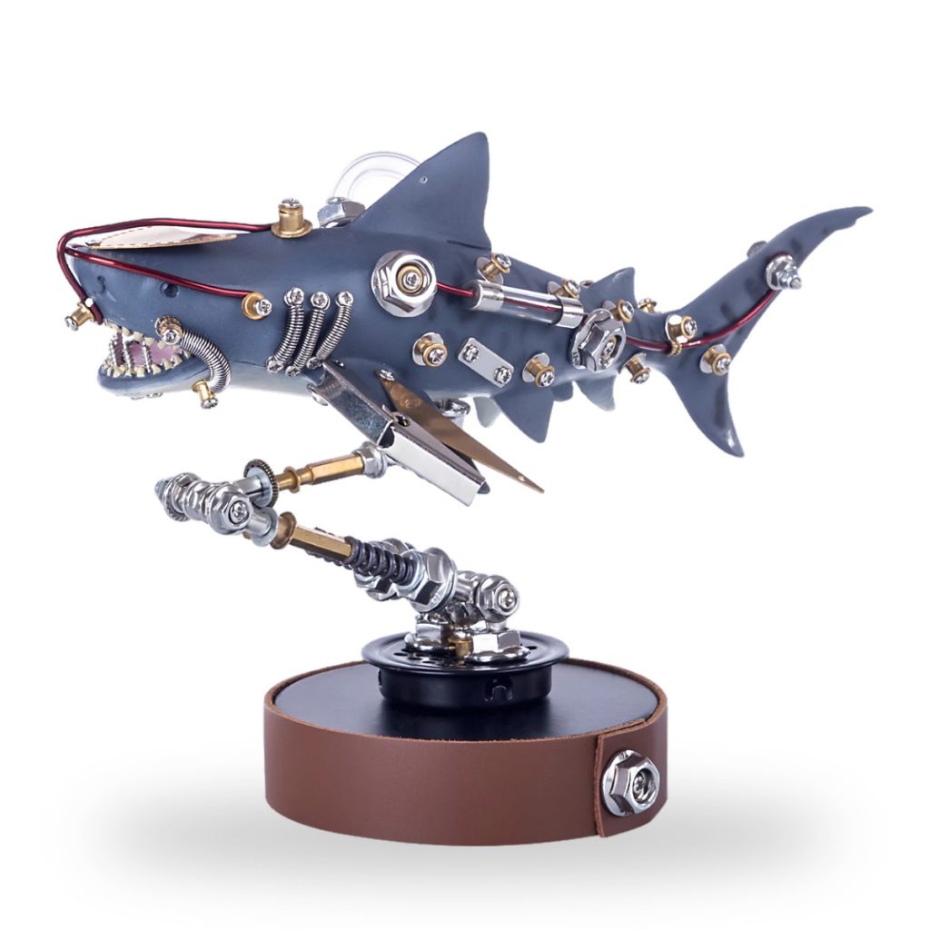 Mechanical shark with exposed gears and bolts on display stand.