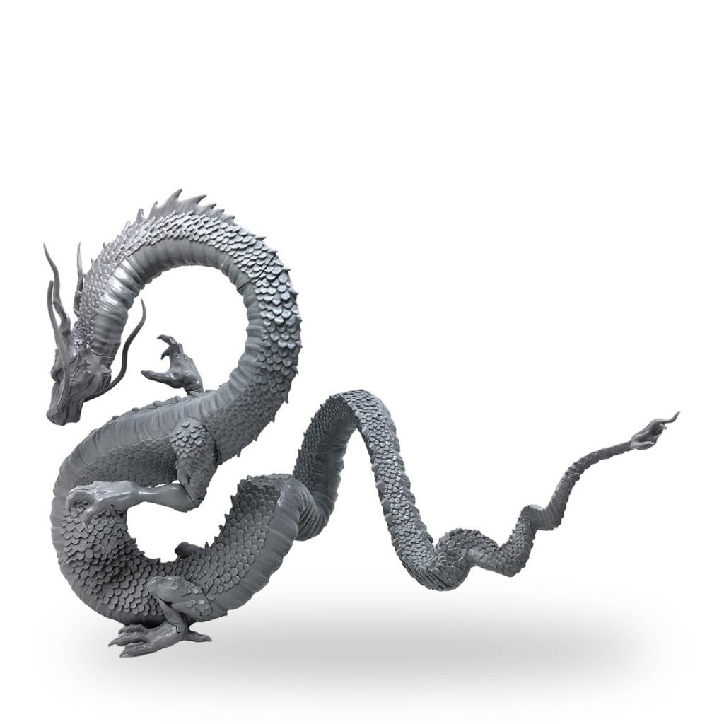 Unpainted gray Chinese dragon figure with detailed scales and claws.
